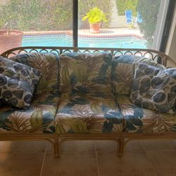 Beautiful Floral Pillows Made On Bamboo Wood Couch