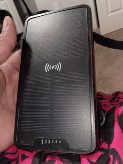 Portable solar cell phone charger