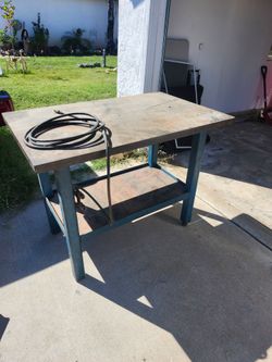 Solid metal work table
