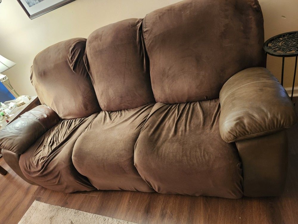 Leather -look brown reclining sofa. Very Comfy!!