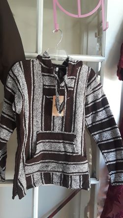 Mexican baja poncho. size Medium, I have 3, they won't last. Beach sweaters