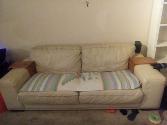Cream leather Couch with 2 wooded trays