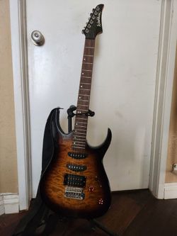 Electric Washburn guitar w/ case, amp,stand,cord ,and strap