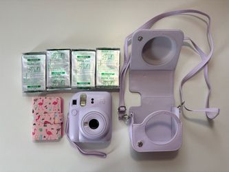 Purple Fujifilm Instax Mini 12 Bundle with Matching Case, Mini Photo Album, and Four Packs of Film
