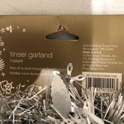 This is a Studio Tord Boontje for Target Mini Seasonal tinsel garland.  Brand/Designer: Studio Tord Boontje for Target Item: Tinsel garland Price: $5.