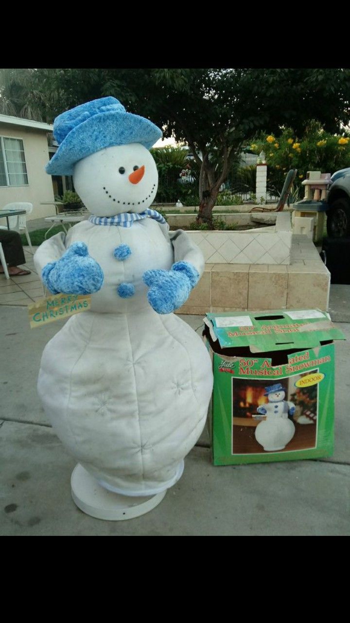 Snowman 4 feet tall plays 3 songs christmas is just around the corner