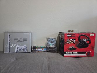 Slim Ps2 with racing wheel, crtv and 13 games
