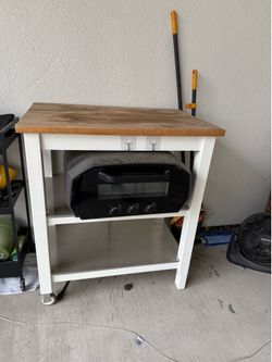 Kitchen island with cutting board