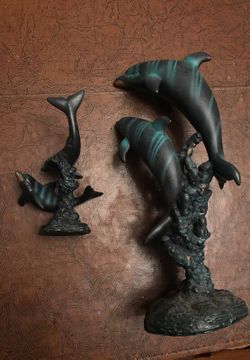 2 dolphins statues