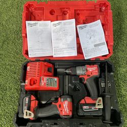 Milwaukee Combo Kit Hammer Drill 1/2” And Impact Driver 1/4” Charger And 2 Batteries 5.0 M18