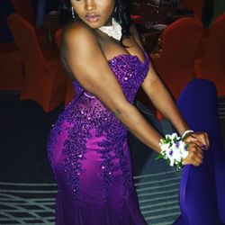 Purple appliqué prom dress.