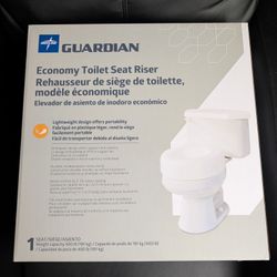 NEVER USED.  Plastic 5in Raised Toilet Seat 