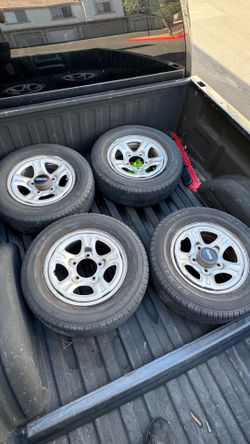 Geo Tracker OEM 15” Aluminum Wheels & Tires – Set of 4