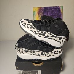 Size 9c - Kids Animal Jordan 11's - $85