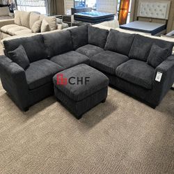Black corduroy sectional sofa with ottoman 
