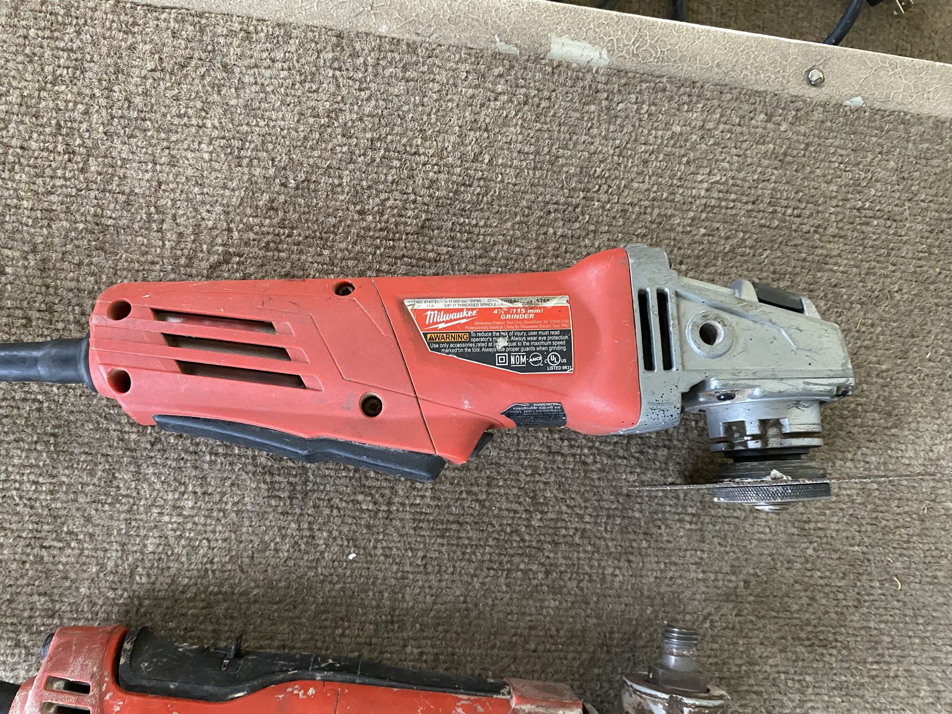 One Milwaukee Grinder,,