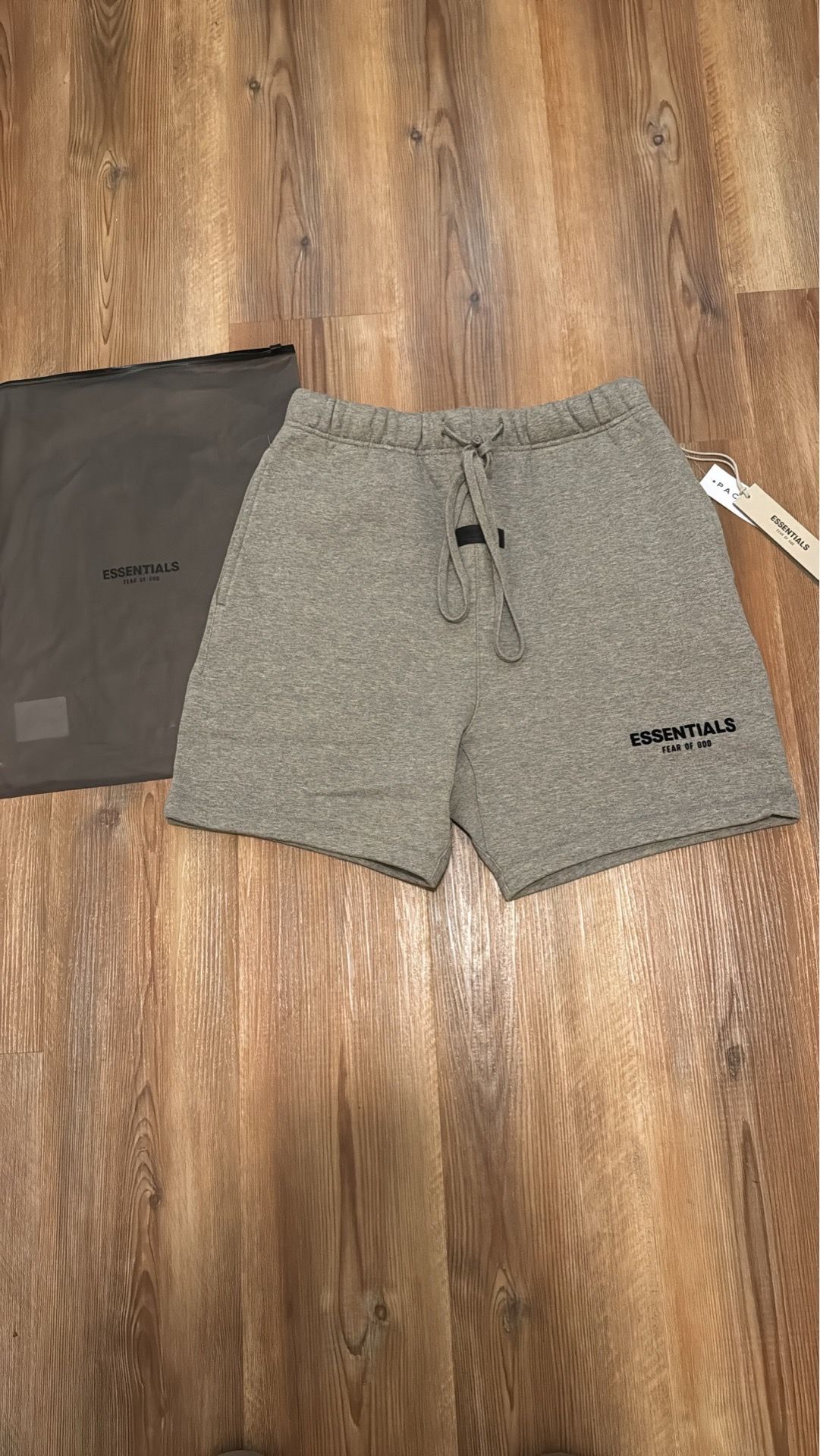 Essentials shorts dark oatmeal size small