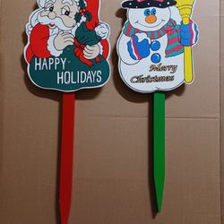 Two vintage Christmas yard signs