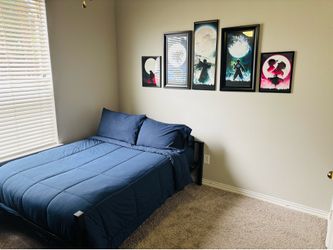 Full size bed, desk, gaming chair and wall art