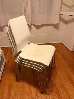 4 white dining chairs
