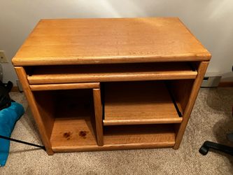 Desk with sliding shelves