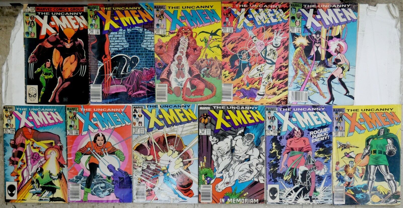 THE UNCANNY X-MEN LOT OF 11 COMIC BOOKS. 197 SEPT, 228 APR, 185 SEPT, 217 MAY, 182 JUNE, 194 JUNE, 189 JAN, 184 AUG, 187 NOV, 196 AUG, 173 SEPT. #1744