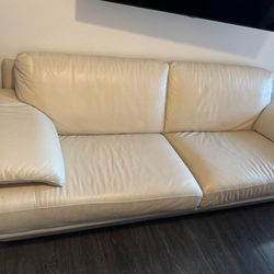 Leather cream sofa by Natuzzi