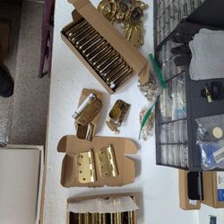 Lot of 40+  Used Residential Hinges Bright Brass Heavy with Screws and Door handles.