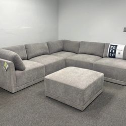 Beautiful grey sectional couch. Modular