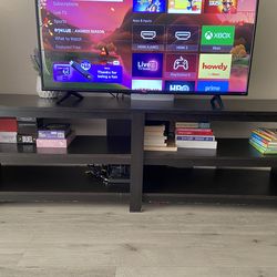 Used black tv console