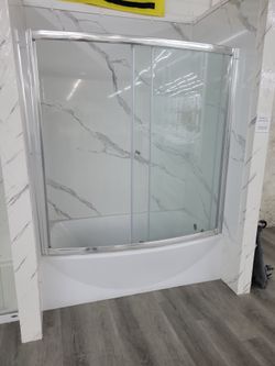 Bathtub and glass door
