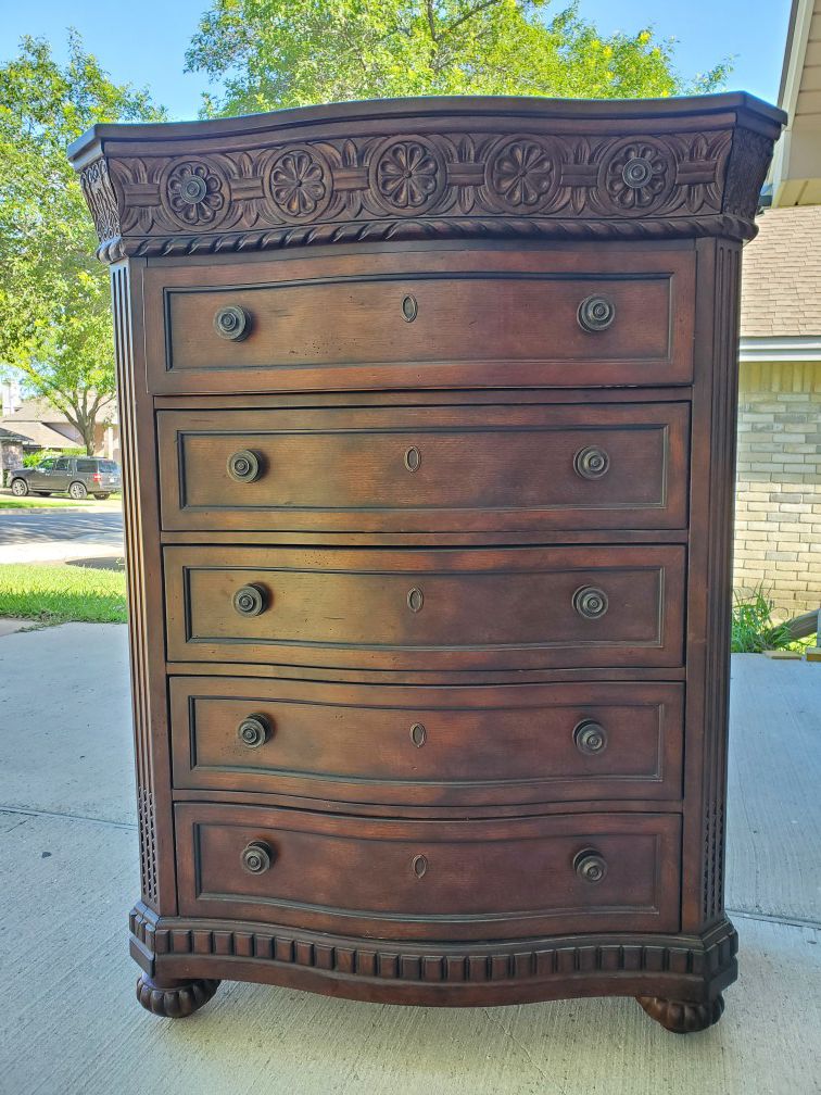 Beautiful Wood Dresser with carved trim. Unique piece really heavy...NOT IKEA!