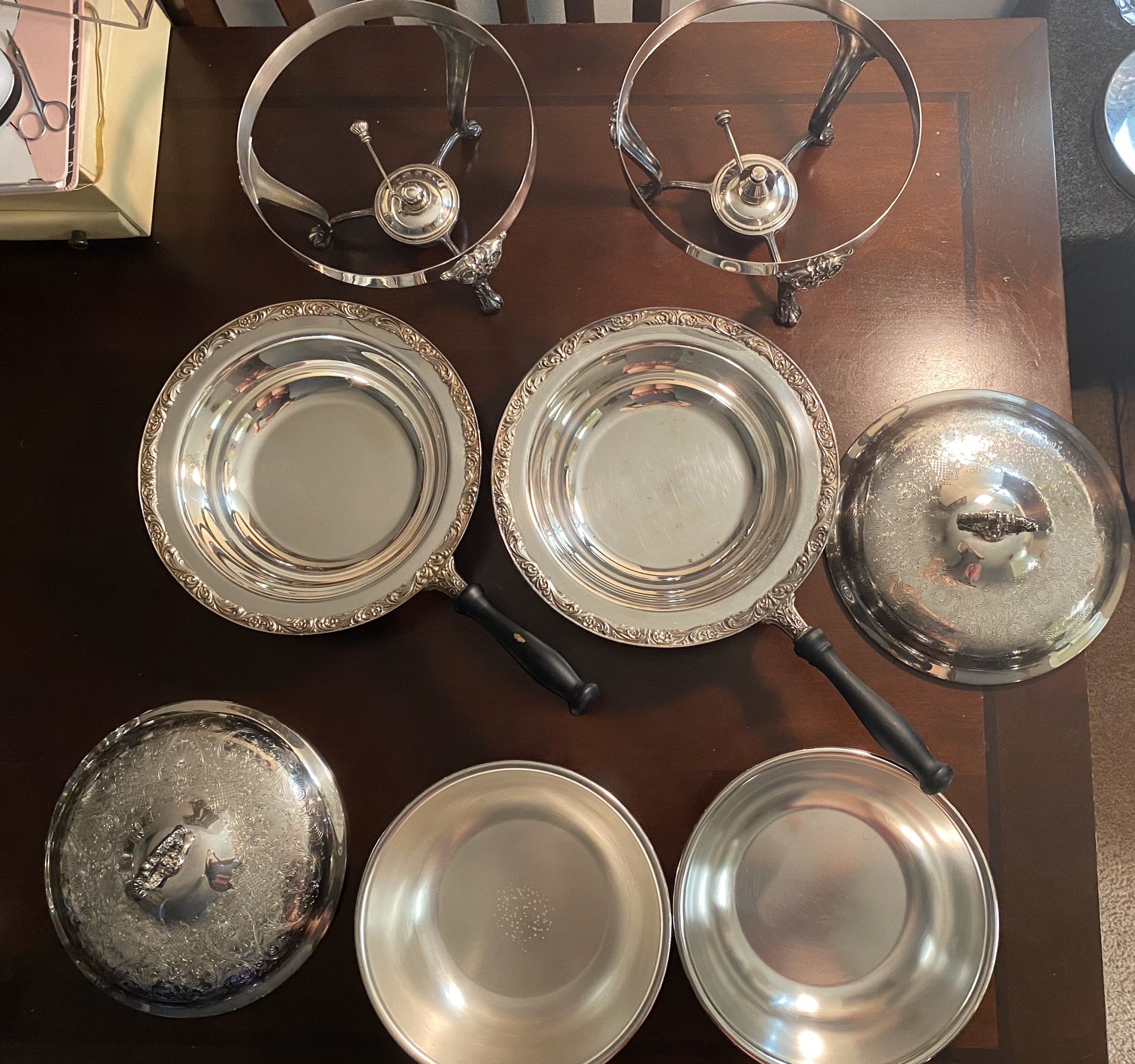 set of two 8-piece food warmers made of silver or silver plating .negotiable