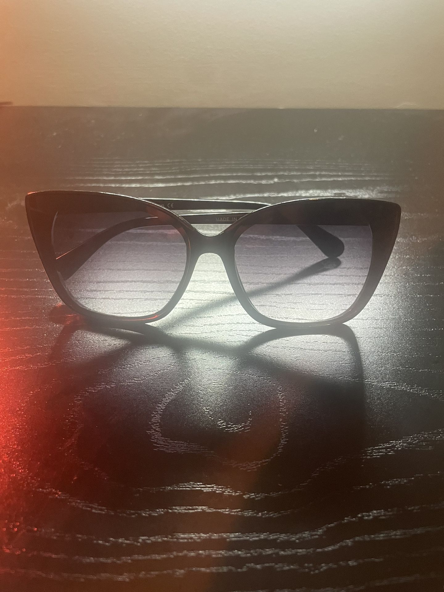 Catherine Malandrino Wmn’s Round Sunglasses Black Rim W/Brown Lenses