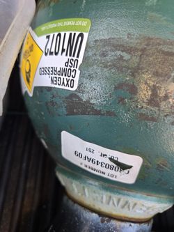 (2) FILLED OXEGYN TANKS