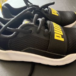 Puma Black and Yellow Sneakers with Modern Athletic Design
