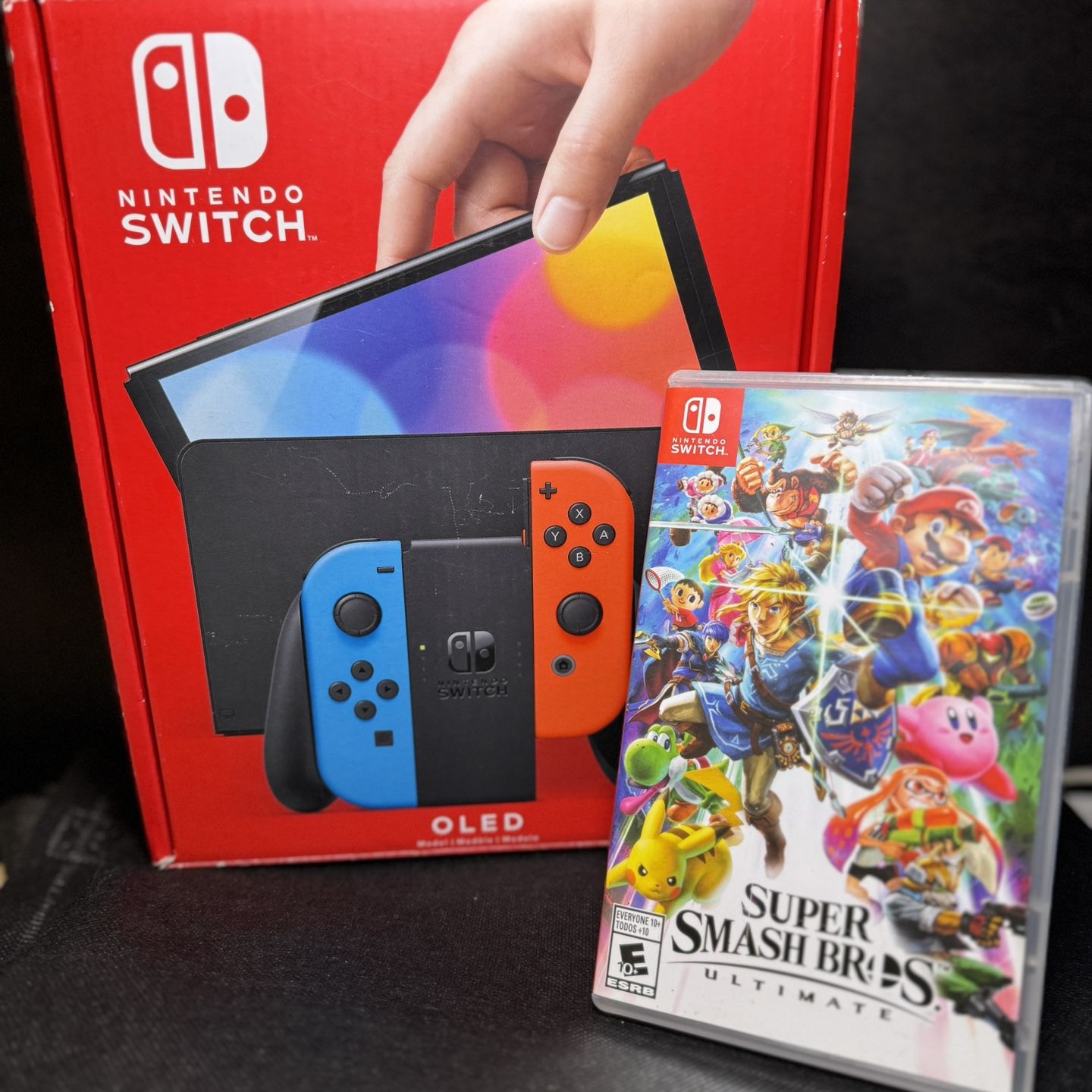 TRADE ONLY FOR OLD VIDEO GAMES Nintendo Switch Oled -LIKE NEW W/ 128 GB Memroy Card and Super Smash Bros Ultimate!!