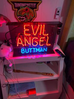 Vintage 1990’s real glass Evil Angel Buttman promo store sign