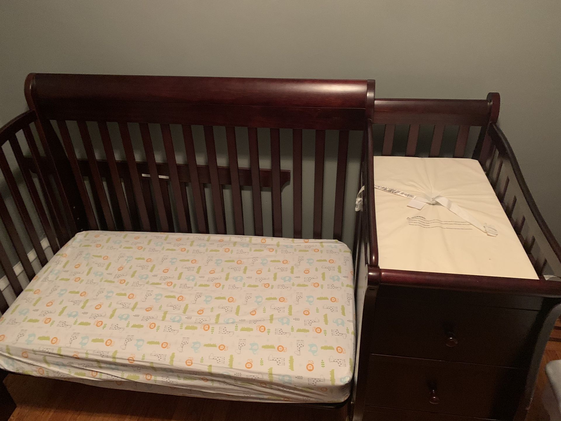 Dresser w/ changing table, crib/toddler bed, mattress-it’s practically new