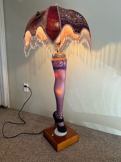 One of a kind local artist made leg lamp with wooden base