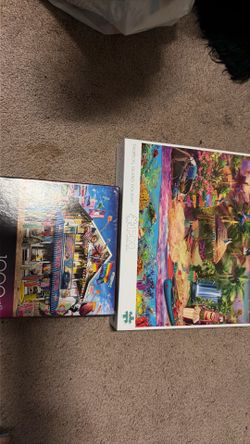 2 beach themed puzzles 1000 and 1500