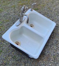 Kohler porcelain double sink w/ faucet & plumbing