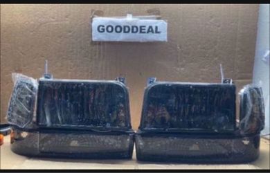 #106 Fit 92-96 F150/250/350/bronco. Smoked Headlight Pair