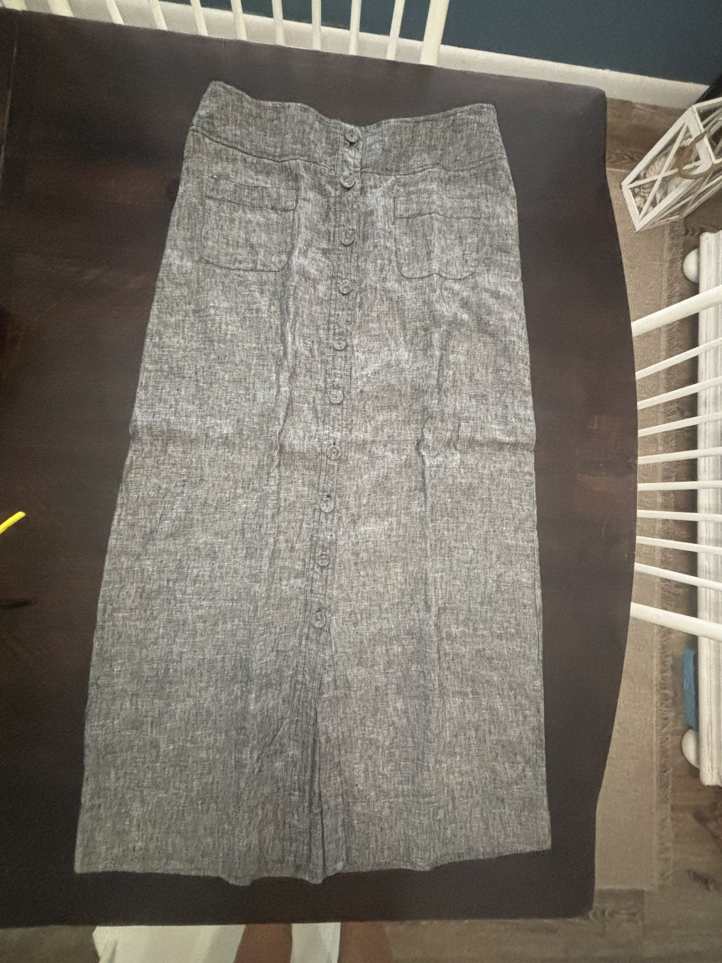 Size 4, gray tweed, long ski skirt excellent condition