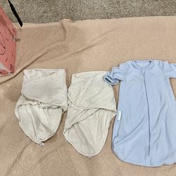 2 miracle blanket swaddles, 1 fleece swaddle, all 3 for $30