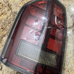 Drivers Chrysler 300 Tail Light Damage