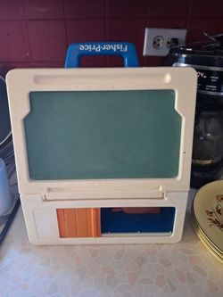 Vintage roll top desk and chalkboard