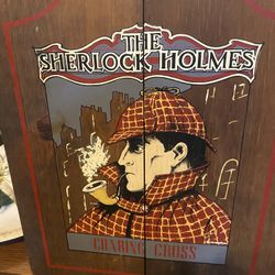978-The Sherlock Holmes Charing Cross, thats what The front of the cabinet reads, "The Sherlock Holmes Charing Cross
