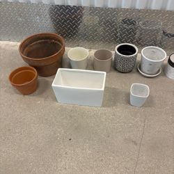 9 ceramic planting pots … various sizes. $30