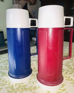 THERMOS HOT & COLD - UNUSED TWO HARD PLASTIC COVERING w/ Drinking Cups Two Colors